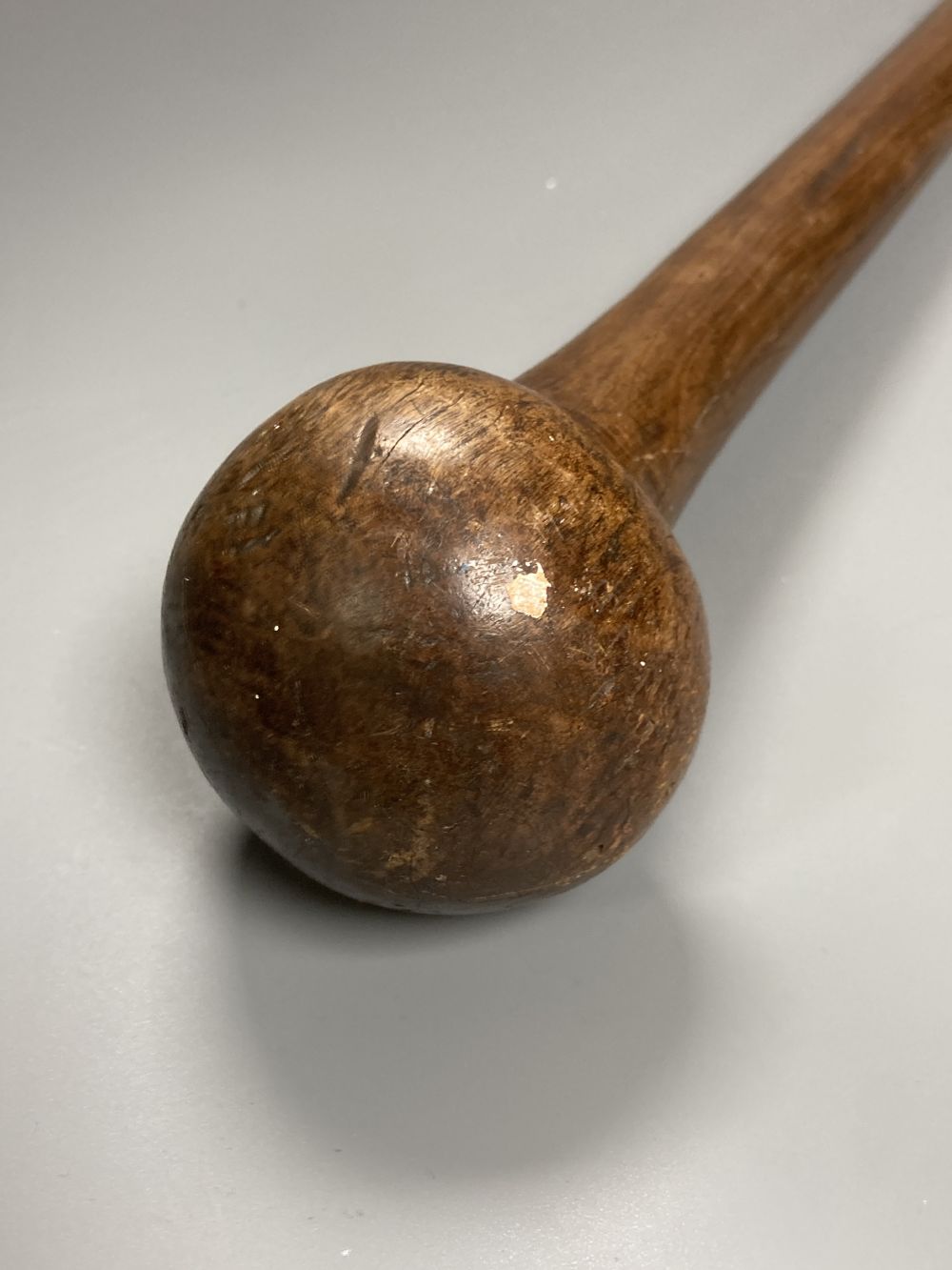 An Asian knobkerrie, length 62cm